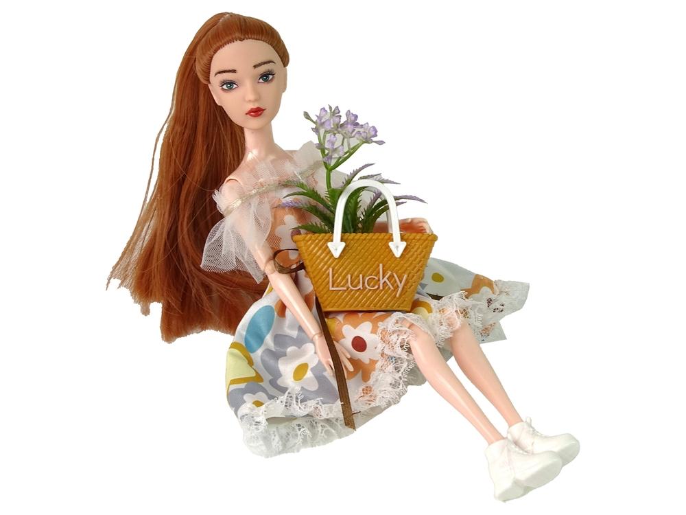 Höstens Emily Doll: Rött hår, blommig klänning, väska och blommor